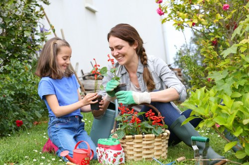 Gardener in Fulham preparing tools in a small garden